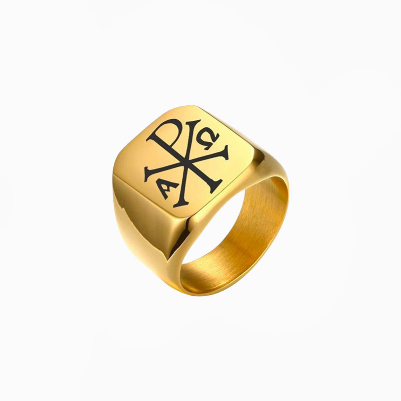 Bague chrisme, dorée, sur fond blanc
