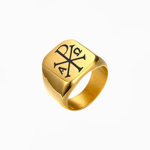 Bague chrisme, dorée, sur fond blanc