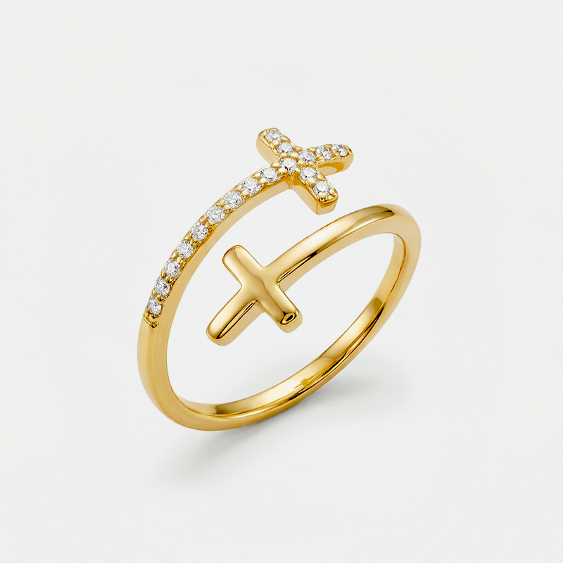 Bague croix double, dorée, sur fond blanc