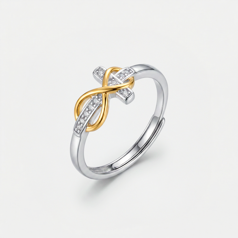 Bague croix infini, bicolore or et argent, sur fond blanc