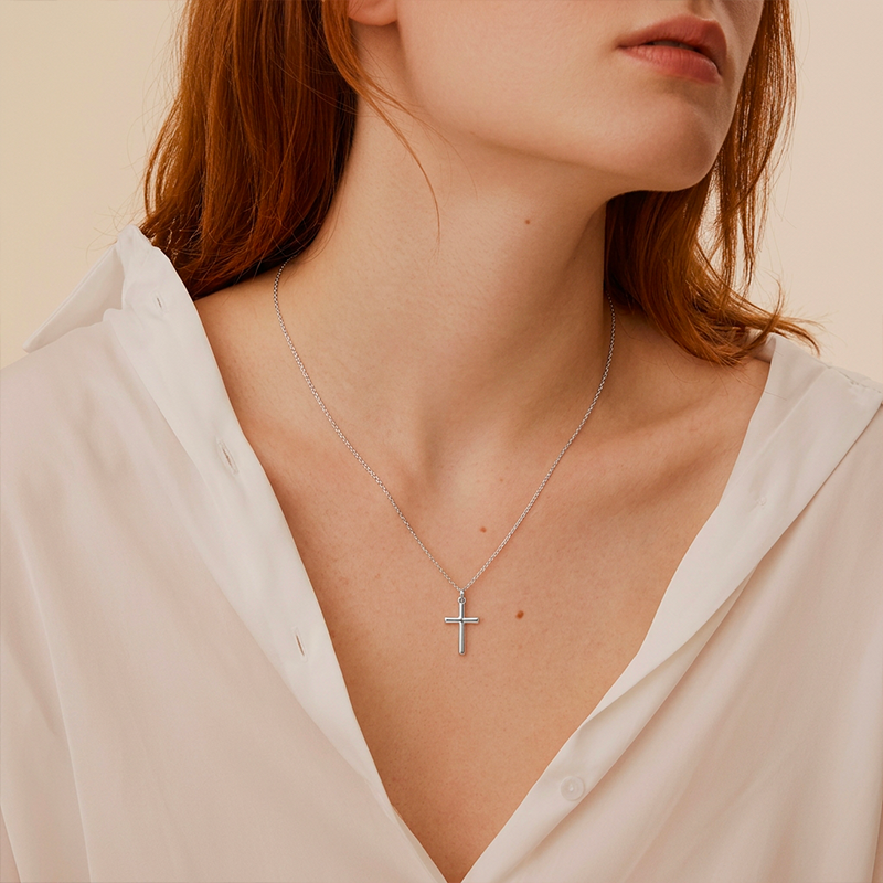 Pendentif croix minimaliste acier