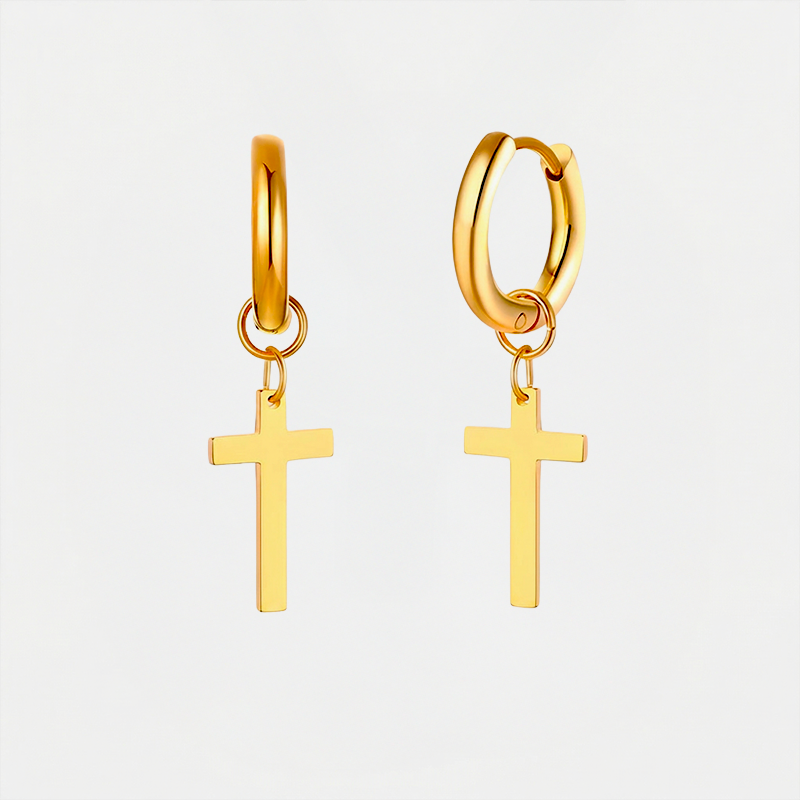 Boucles d'oreilles croix acier, dorées, sur fond blanc