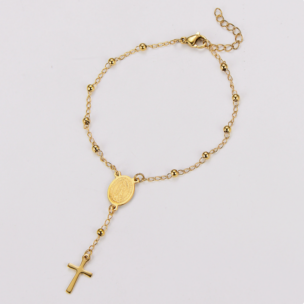 Bracelet chapelet, doré, sur fond blanc