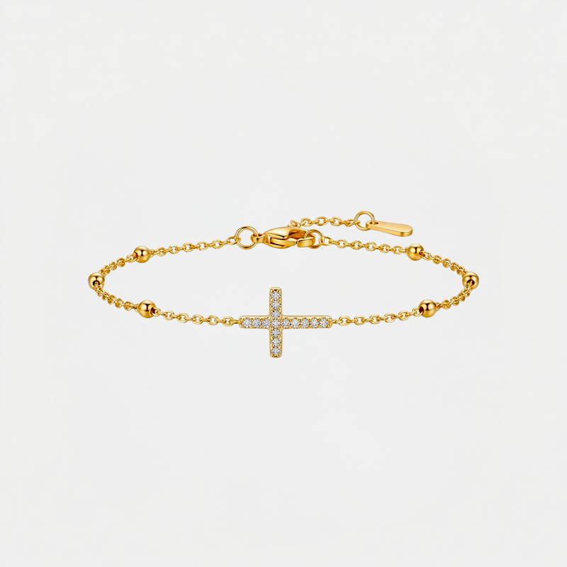 Bracelet croix acier inoxydable, doré, sur fond blanc