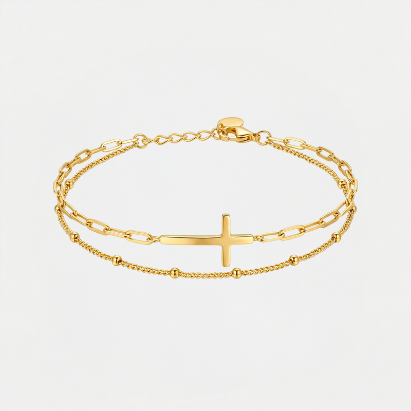 Bracelet croix de Jésus, doré, sur fond blanc