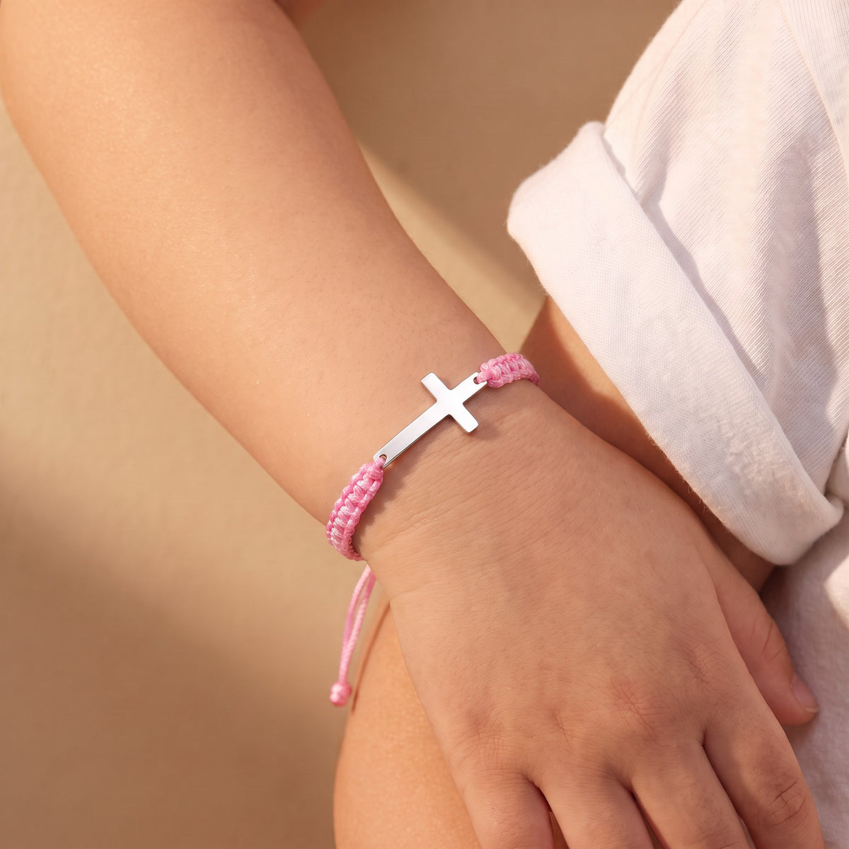 Bracelet croix enfant rose acier inoxydable