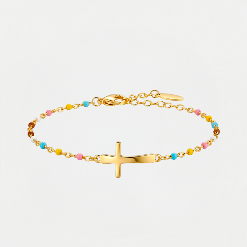 Bracelet croix fantaisie, doré, sur fond blanc