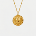 Collier Coeur Sacré, doré, sur fond blanc