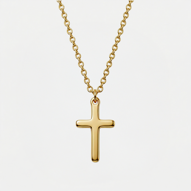Collier croix enfant, doré, sur fond blanc