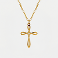 Collier croix fantaisie, doré, sur fond blanc