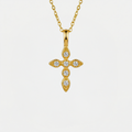 Collier croix strass, doré, sur fond blanc
