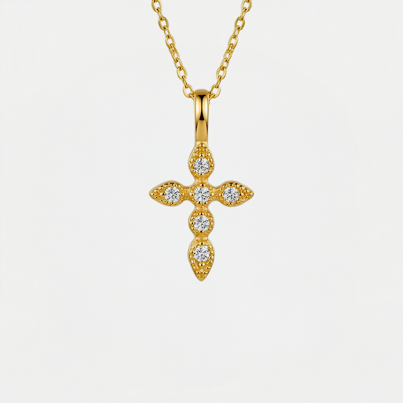 Collier croix strass, doré, sur fond blanc