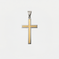 Pendentif croix bicolore, or et argent, sur fond blanc