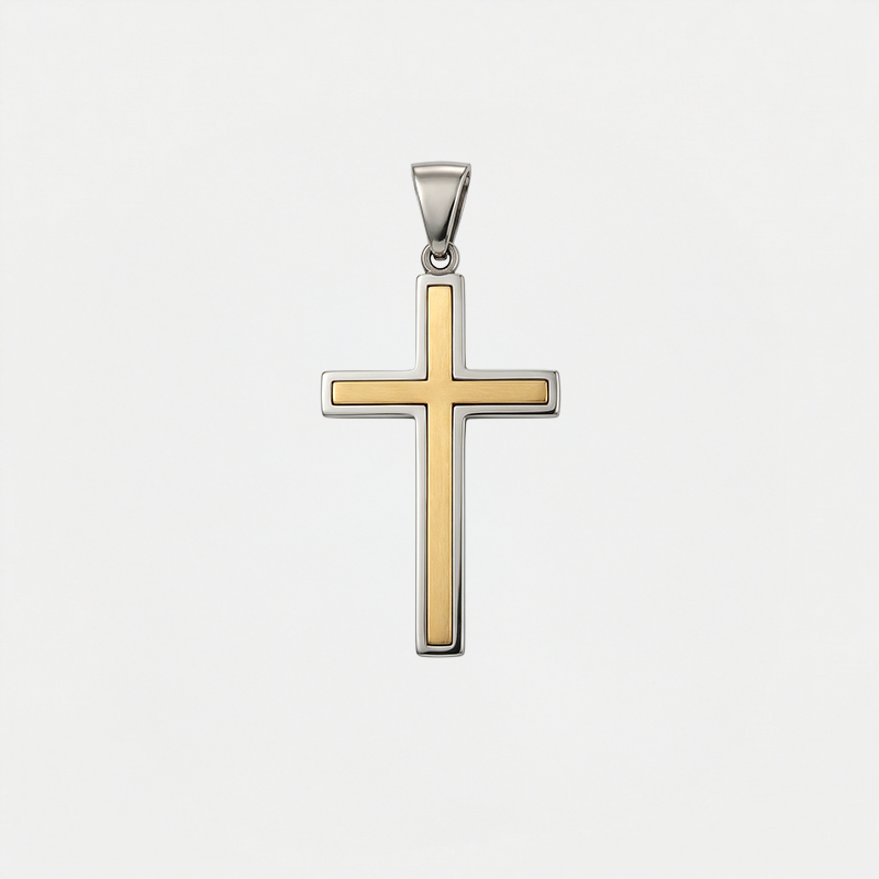 Pendentif croix bicolore, or et argent, sur fond blanc