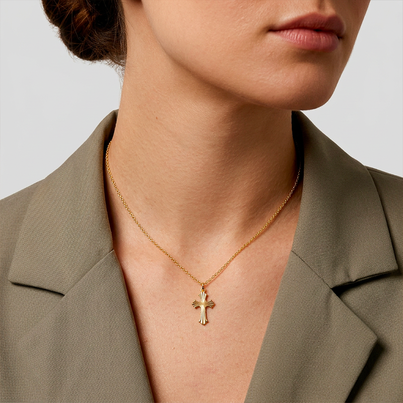 Pendentif croix ciselé dorée
